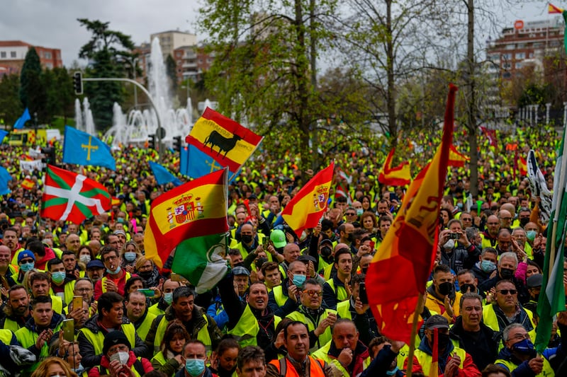 Lorry drivers take to the streets of Madrid in Spain to protest against the high price of fuel. AP