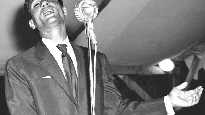 Egyptian singer Abdel Halim Hafez during a live performance in 1959 in Lebanon. One of Egypt's most popular singers, he'll be the first subject of Dubai's new hologram concerts. AFP