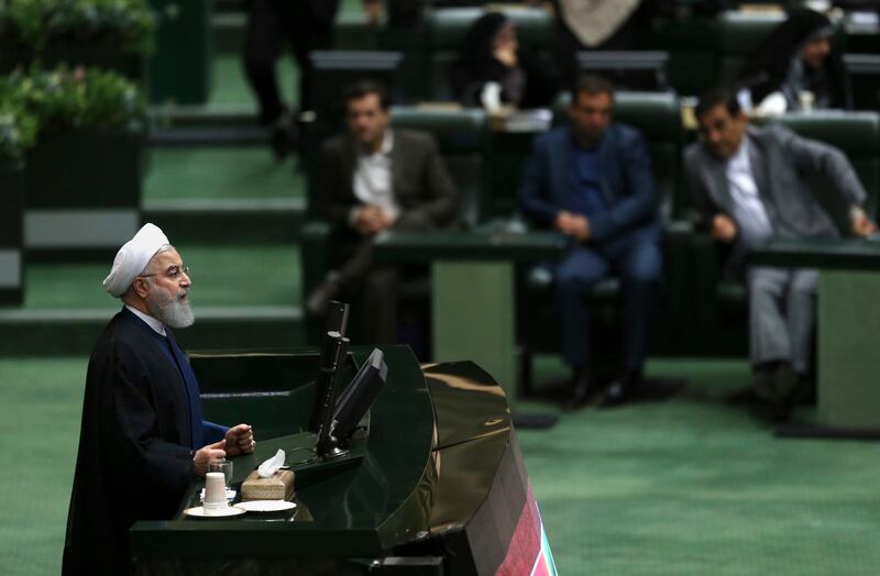 Iranian President Hassan Rouhani defends his proposed ministers of energy and science in an open session of parliament, in Tehran, Iran, Sunday, Oct. 29, 2017. On Sunday parliament approved Reza Ardakanian to work as energy minister and Mansour Gholami as minister of science who is in charge of higher education and universities, completing Rouhaniâ€™s 18-minister cabinet. (AP Photo/Vahid Salemi)