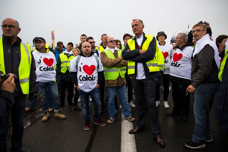 French business owners and locals blockade the main road into the Port of Calais, demanding the removal of the 'Jungle' camp in September 2016