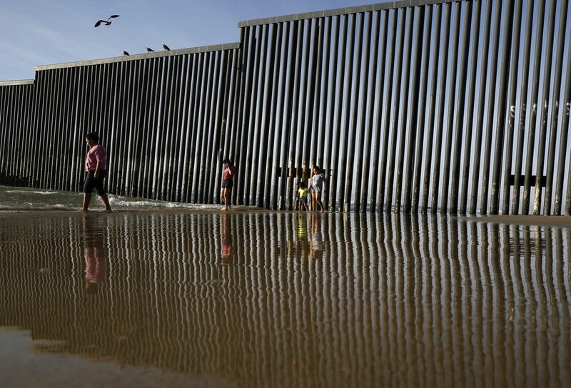 Above, the border structure separating San Diego, California from Tijuana, Mexico. US president Donald Trump's plan to build a wall along its border with Mexico is facing resistance even from his own party. Gregory Bull / AP Photo