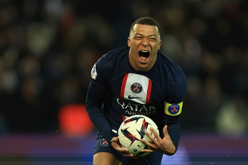 Kylian Mbappe celebrates after scoring for PSG in Ligue 1 earlier this season. AP