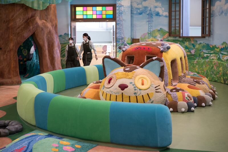 The Cat Bus from the film 'My Neighbor Totoro' in the Ghibli's Grand Warehouse area. Getty Images