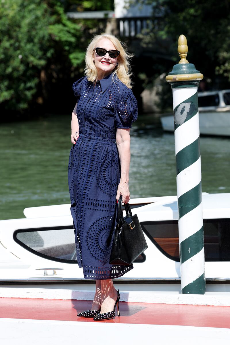 Patricia Clarkson in a blue, broderie Anglaise dress. Getty