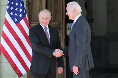 Russian President Vladimir Putin shakes hands with his US counterpart Joe Biden in Geneva. AP 