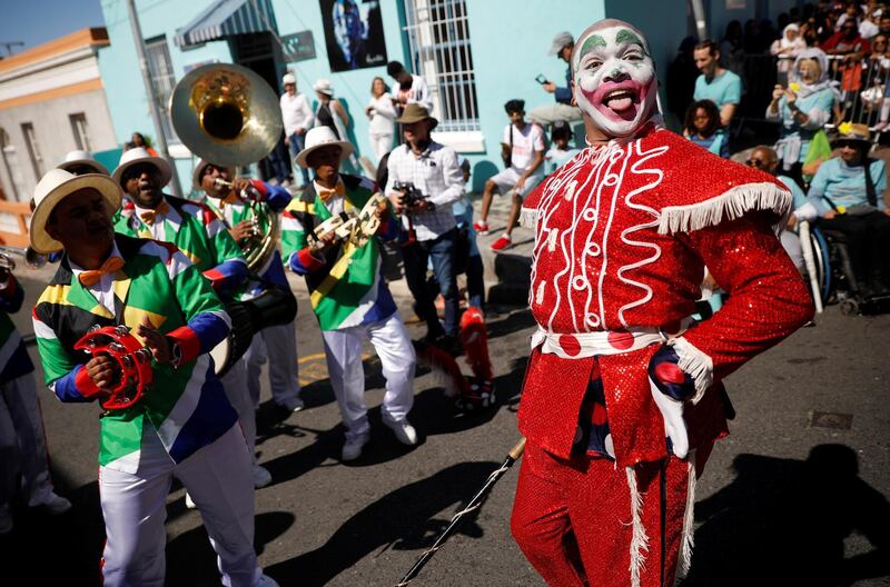 Artists perform ahead of the arrival of the Duke and Duchess of Sussex during Heritage Day celebrations in Bo Kaap. Reuters