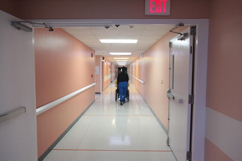 A nurse pushes a patient in a wheelchair through a hall of the Juan F. Luis Hospital and Medical Center in Christiansted, on the outskirts of St Croix, U.S. Virgin Islands June 29, 2017. Picture taken June 29, 2017. REUTERS/Alvin Baez