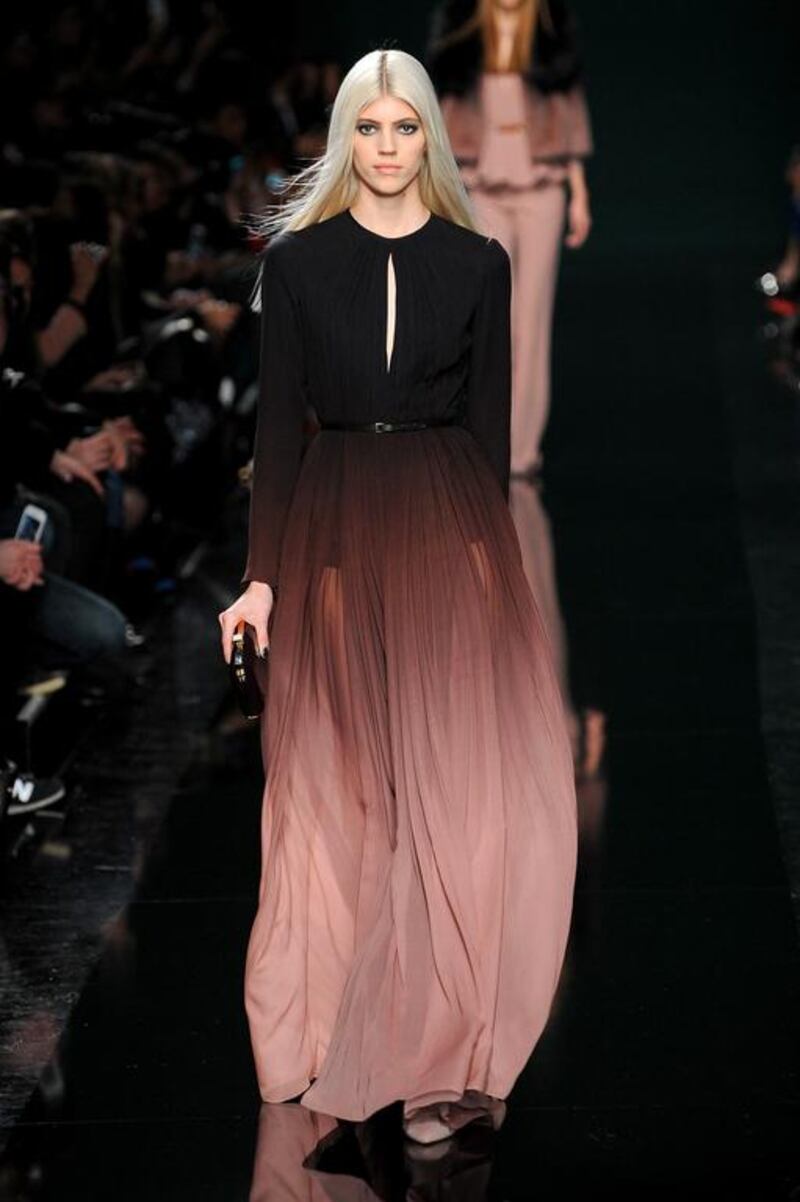 Elie Saab nevertheless continues to dramatically refine his style, this season evoking the strongest character yet in his wearer. Starting with powerful, plain trouser suits that let the cut do all the talking, with slender trousers and sweeping cloak-like coats, he moved on to a dark dip-dye ­effect in dresses from silk velvet to ribbed wool, in burgundy, pink and blackened mauve. Francois Durand / Getty Images