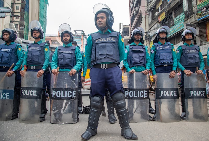 Police officers have been deployed in anticipation of large protests from supporters of the opposition alliance ahead of Bangladesh's election. EPA