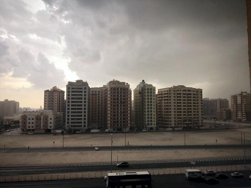 Rain fell in the Al Nahda area of Dubai on Tuesday morning. Kumar Shyam / The National