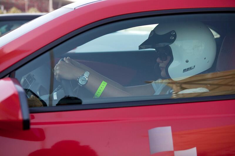 Abu Dhabi, United Arab Emirates, May 27, 2013:    A woman sits behind the wheel of a Chevrolet Camaro SS while taking part in a driving expirence during a corporate open day at the Yas Marina Circuit in Abu Dhabi on May 27, 2013. Christopher Pike / The National\

