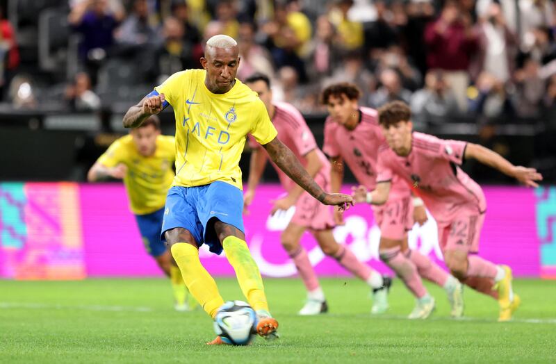 Al Nassr's Anderson Talisca scores their fourth goal from the penalty spot. Reuters