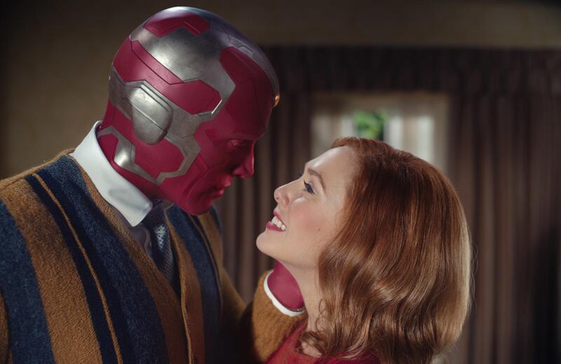 Paul Bettany is Vision and Elizabeth Olsen is Wanda Maximoff in marvel Studios' WandaVision. Courtesy Disney+