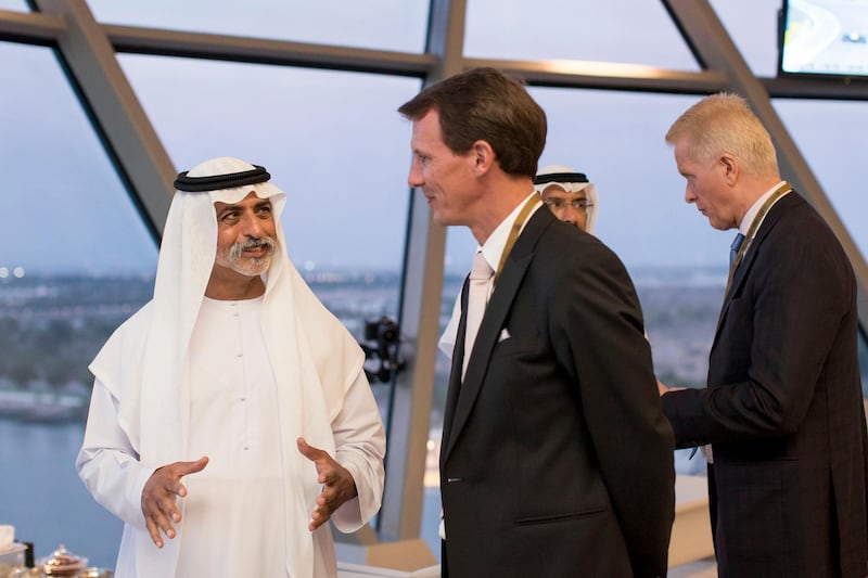 ABU DHABI, UNITED ARAB EMIRATES - November 03, 2013: HH Sheikh Nahyan bin Mubarak Al Nahyan Minister of Culture Youth and Community Development  (L), and HRH Joachim Holger Waldemar Christian Prince of Denmark (2nd L), attend the final race of the Formula 1 Etihad Airways Abu Dhabi Grand Prix at Yas Marina Circuit.
( Ryan Carter / Crown Prince Court - Abu Dhabi )
--- *** Local Caption ***  20131103RC_C6_6589.JPG