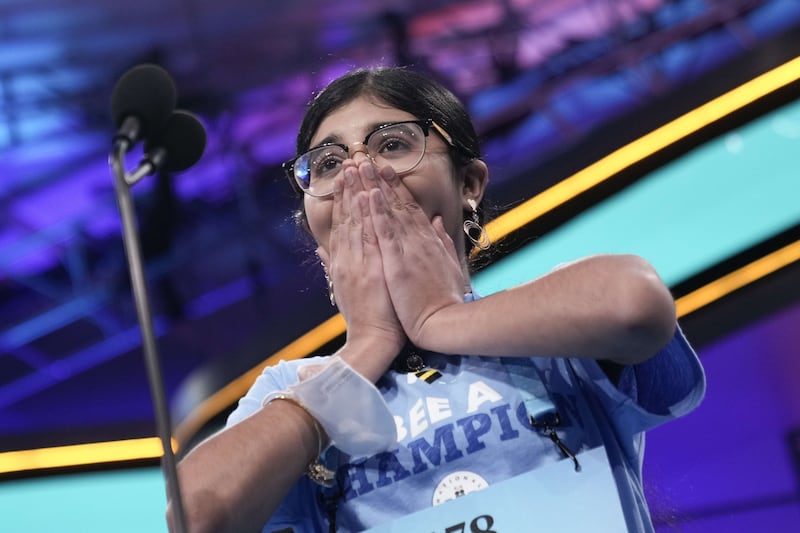 Sahana Srikanth, from Cincinnati, Ohio, reacts after spelling a word correctly. AFP