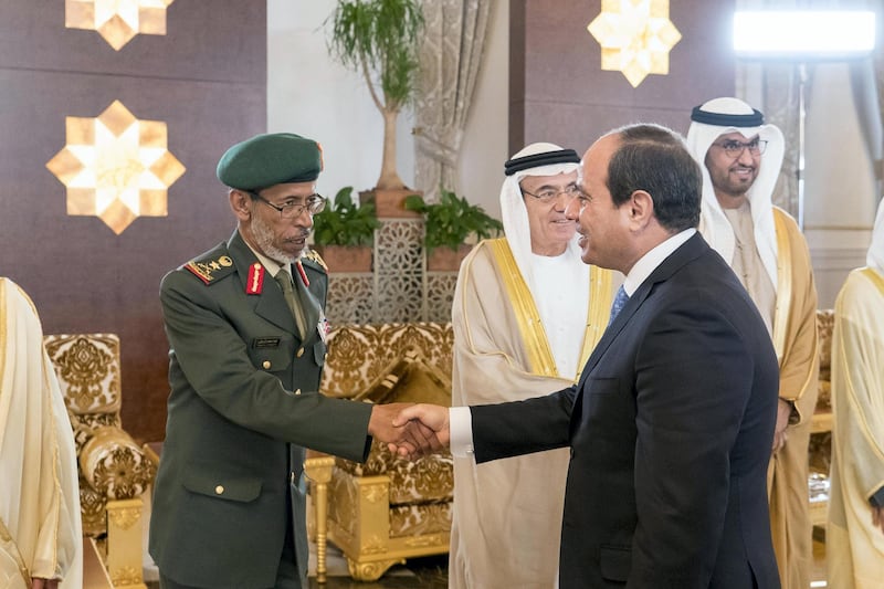 ABU DHABI, UNITED ARAB EMIRATES - February 06, 2018: HE Lt General Hamad Thani Al Romaithi, Chief of Staff UAE Armed Forces (L), greets HE Abdel Fattah El Sisi, President of Egypt (R), during a reception at the Presidential Airport. Seen with HE Zaki Anwar Nusseibeh,(C) and HE Dr Sultan Ahmed Al Jaber, UAE Minister of State, Chairman of Masdar and CEO of ADNOC Group (back R).

( Rashed Al Mansoori / Crown Prince Court - Abu Dhabi )
---