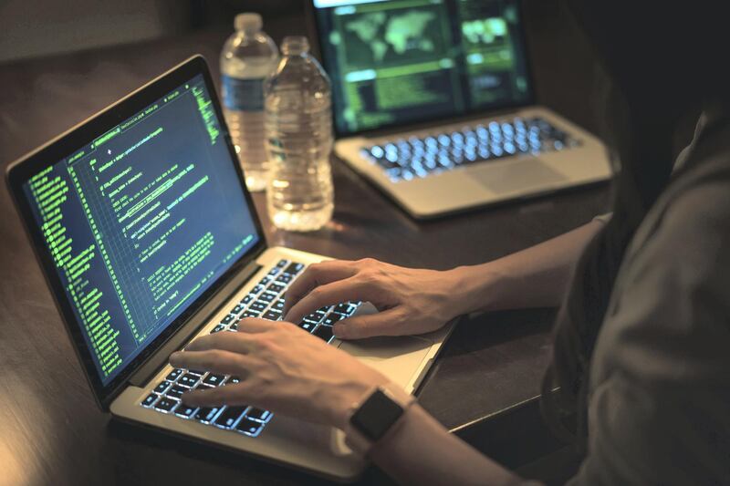 young lady hacking a computer network, or using computer