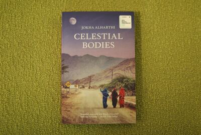 A copy of 'Celestial Bodies' by Arabic author Jokha Alharthi, translated by Marilyn Booth, which has won the Booker International Prize in London on May 21, 2019. / AFP / Isabel INFANTES
