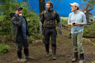 Joe and Anthony Russo on the 'Avengers: Infinity War' set with Chris Evans. Marvel / Disney / Kobal / Shutterstock