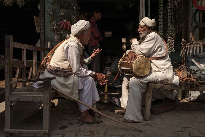 Two band members in discussion in Sahiwal, Pakistan. Courtesy Sohail Karmani