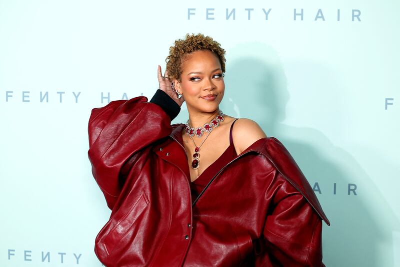 Rihanna wore a ruby choker and three-stone pendant by Indian designers at the Fenty Hair brand launch in Los Angeles on Wednesday. Getty Images