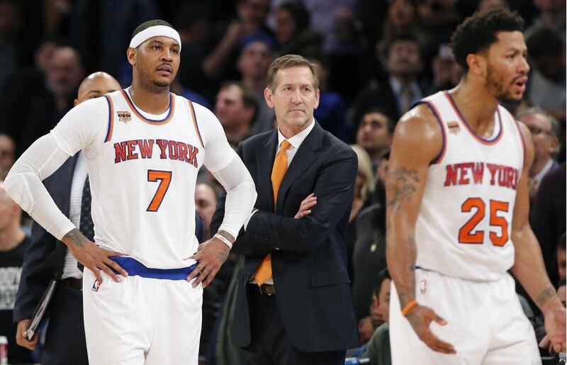 New York Knicks forward Carmelo Anthony, left, has come in for criticism from franchise director Phil Jackson. Kathy Willens / AP Photo