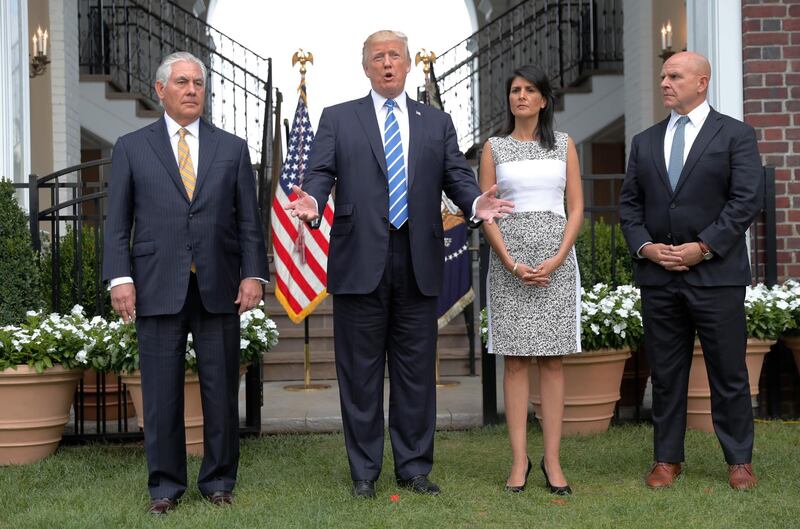 President Donald Trump speaks as Secretary of State Rex Tillerson, U.S. Ambassador to the United Nations Nikki Haley, and national security adviser H.R. McMaster listen at Trump National Golf Club in Bedminster, N.J., Friday, Aug. 11, 2017. (AP Photo/Pablo Martinez Monsivais)
