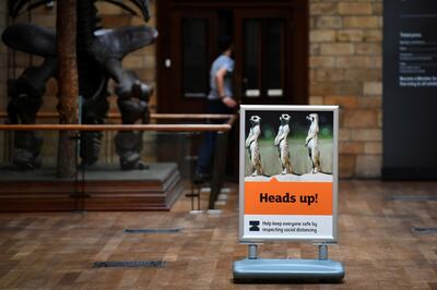 A sign is seen at the Natural History Museum during preparations to reopen, after the outbreak of the coronavirus disease (COVID-19) caused its closure, in London, Britain July 27, 2020. Picture taken July 27, 2020. REUTERS/Dylan Martinez