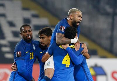 Everton Ribeiro celebrates scoring for Brazil against Venezuela. Reuters