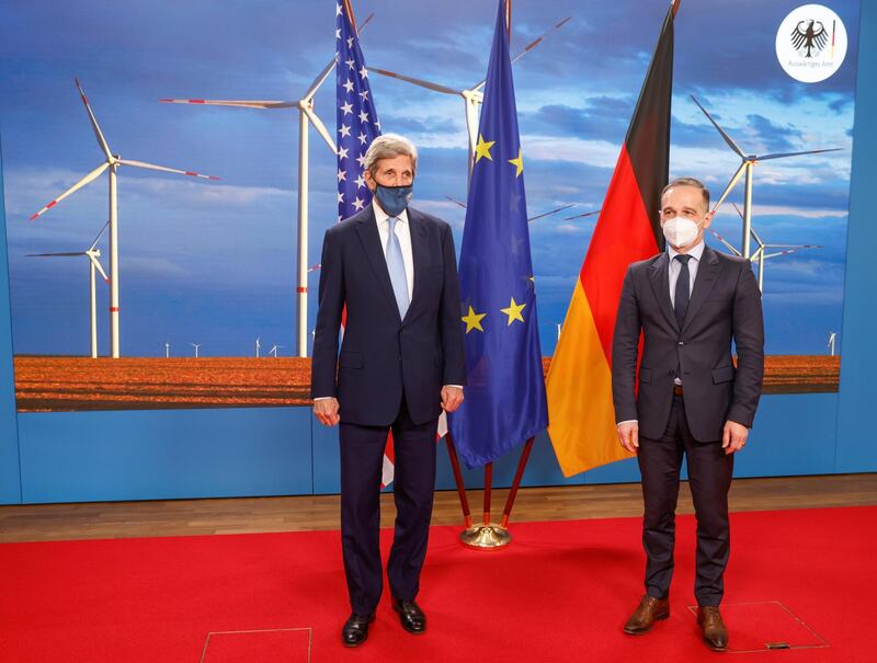 Germany's Foreign Minister Heiko Maas and U.S. Special Presidential Envoy for Climate John Kerry  pose for a photograph prior to a meeting at the Foreign Office in Berlin, Germany May 18, 2021. Odd Andersen/Pool via REUTERS