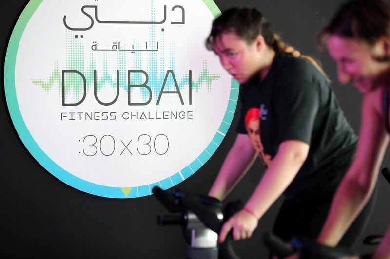 Dubai, United Arab Emirates - October 26, 2018:  Spinning class at Dubai Fitness Challenge. The Crown Prince of Dubai renews his emirate-wide call for every resident to take part in 30 minutes of exercise for 30 days. Friday, October 26th, 2018 Festival City Mall, Dubai. Chris Whiteoak / The National