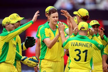 Jason Behrendorff, centre, took figures of 5-44 to bowl Australia to victory over England at the Cricket World Cup. Press Association