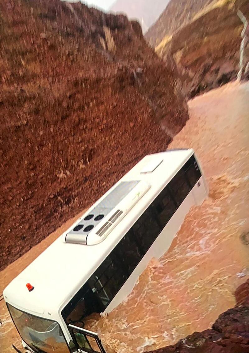 A bus carrying 20 passenger gets caught in a valley in Hatta. Courtesy: Dubai Police