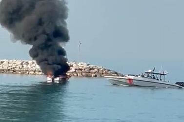 A boat catches fire in a port in Ras Al Khaimah. Courtesy: Khalifa Al Mehairi