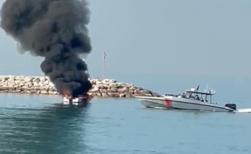 A boat catches fire in a port in Ras Al Khaimah. Courtesy: Khalifa Al Mehairi
