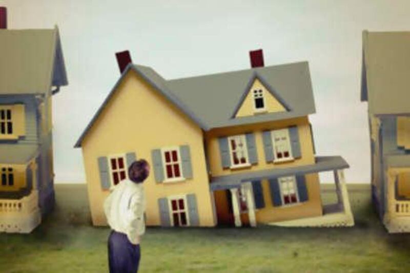 Man Looking at Sinking House