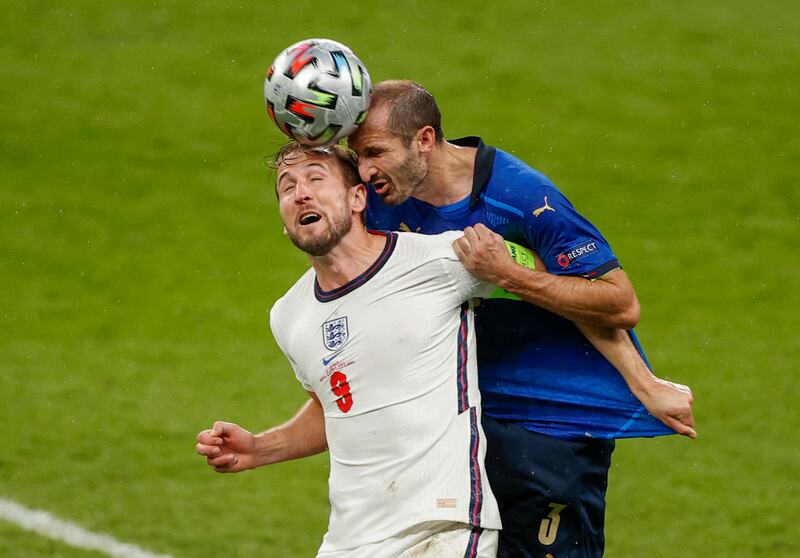 England captain Harry Kane battles for a header with Giorgio Chiellini of Italy.