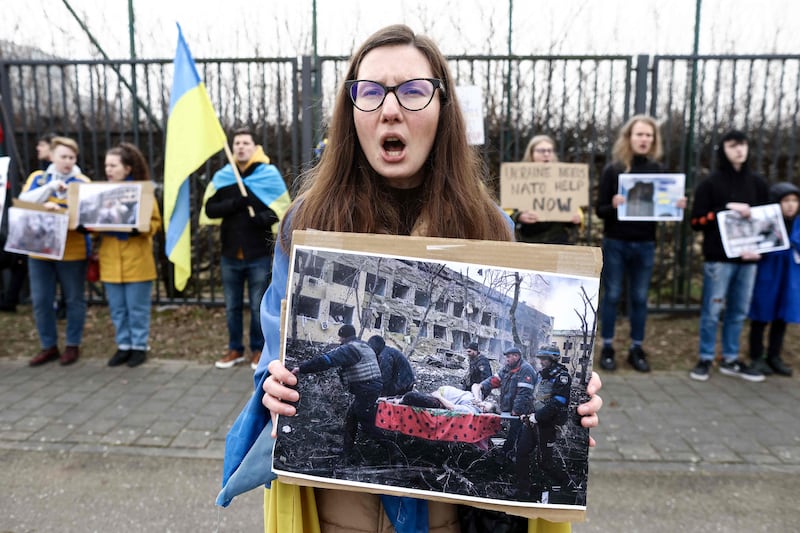 An anti-war protester demonstrates against Russia's invasion of Ukraine in front of the Nato headquarters in Brussels. AFP