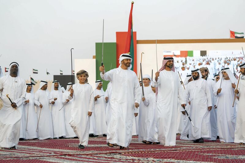 AL WATHBA, ABU DHABI, UNITED ARAB EMIRATES - December 03, 2017: HH Sheikh Mohamed bin Zayed Al Nahyan Crown Prince of Abu Dhabi Deputy Supreme Commander of the UAE Armed Forces (C), attends the Sheikh Zayed Heritage Festival. Seen with HH Sheikh Ammar bin Humaid Al Nuaimi, Crown Prince of Ajman (R), HH Sheikh Zayed bin Mohamed bin Hamad bin Tahnoon Al Nahyan (3rd R), HH Sheikh Tahnoon bin Mohamed Al Nahyan, Ruler's Representative in Al Ain Region (back 3rd R), HH Sheikh Nahyan bin Mubarak Al Nahyan, UAE Minister of State for Tolerance (back 2nd R) and HH Sheikh Khalifa bin Tahnoon bin Mohamed Al Nahyan, Director of the Martyrs' Families' Affairs Office of the Abu Dhabi Crown Prince Court (back R).


( Rashed Al Mansoori / Crown Prince Court - Abu Dhabi )
---