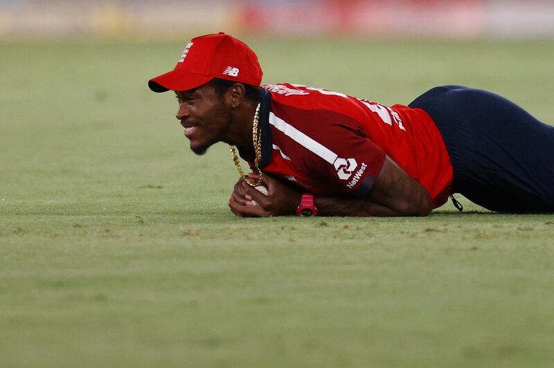 Cricket - Third Twenty20 International - India v England - Narendra Modi Stadium, Ahmedabad, India - March 16, 2021 England's Jofra Archer catches out India's Rohit Sharma REUTERS/Danish Siddiqui