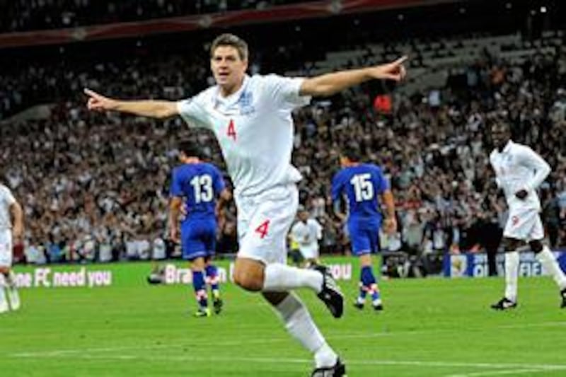 Steven Gerrard, of England, celebrates after scoring the second goal against Croatia.