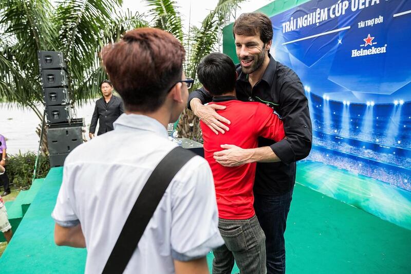 Fans greet Ruud Van Nistelroy during the Heineken Uefa Champions League trophy tour on Friday in Ho Chi Minh City, Vietnam. Nicolas Axelrod / Getty Images / April 4, 2014 