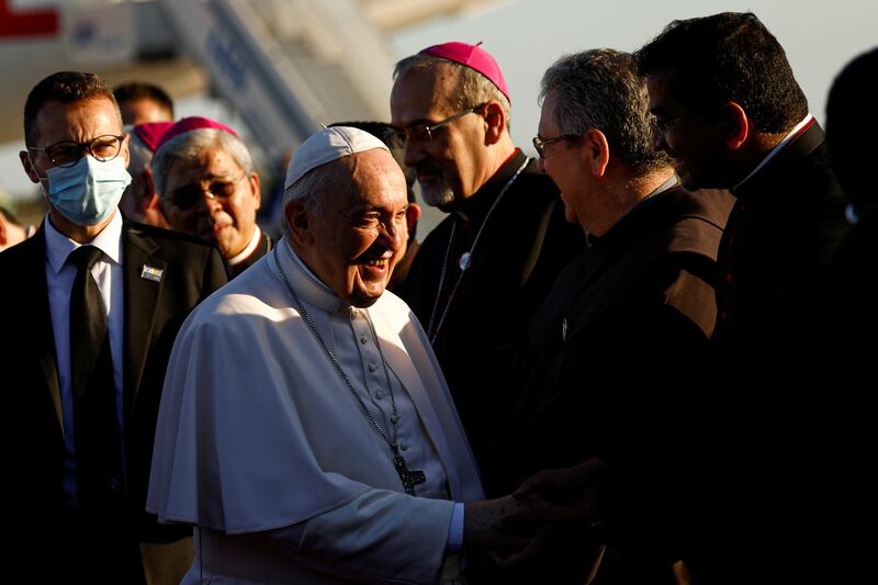 Pope Francis is greeted at Larnaca International Airport. Reuters