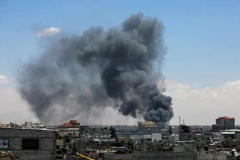 Smoke rises after an Israeli strike on Tuesday, as forces launch a ground and air operation in eastern Rafah. Reuters