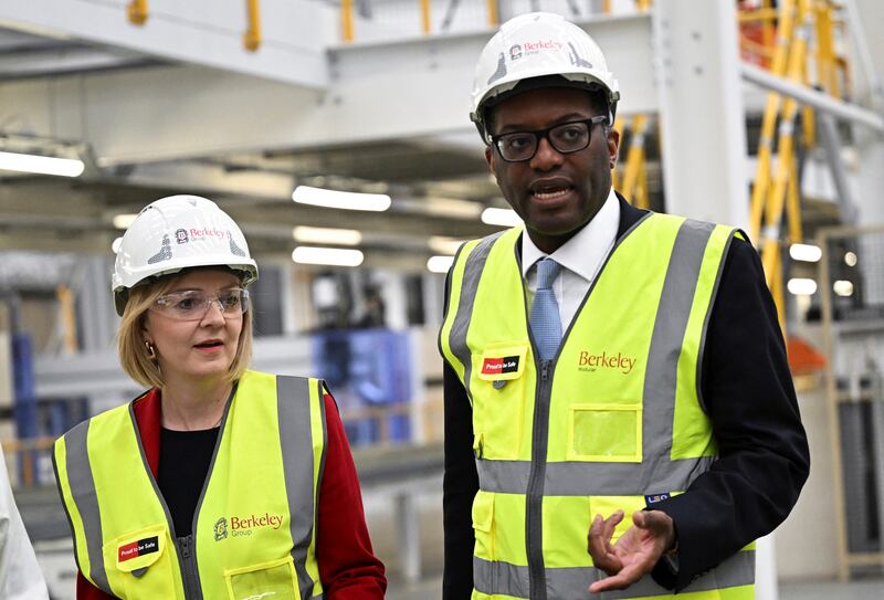 British Prime Minister Liz Truss and Chancellor of the Exchequer Kwasi Kwarteng visit Berkeley Modular in Kent on Friday. AP Photo