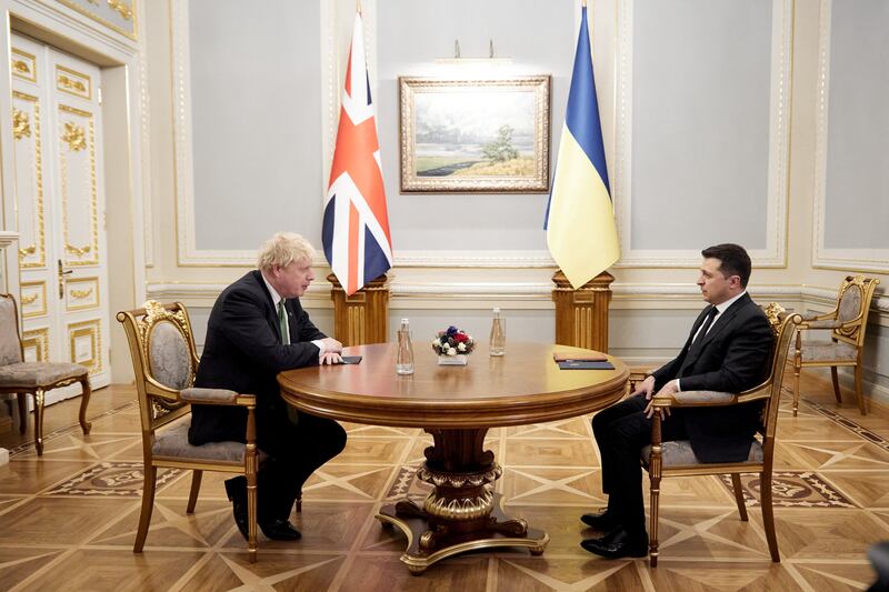 Ukrainian President Volodymyr Zelenskiy and British Prime Minister Boris Johnson attend a meeting in Kyiv, Ukraine February 1, 2022.  Ukrainian Presidential Press Service/Handout via REUTERS ATTENTION EDITORS - THIS IMAGE WAS PROVIDED BY A THIRD PARTY. 