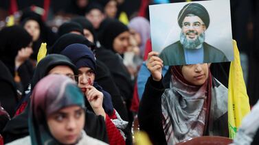 A supporter of Hezbollah at a rally commemorating the group's leaders, in Beirut's suburbs, on February 16. Reuters