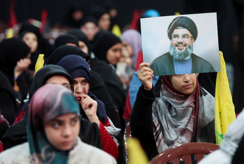 A supporter of Hezbollah at a rally commemorating the group's leaders, in Beirut's suburbs, on February 16. Reuters