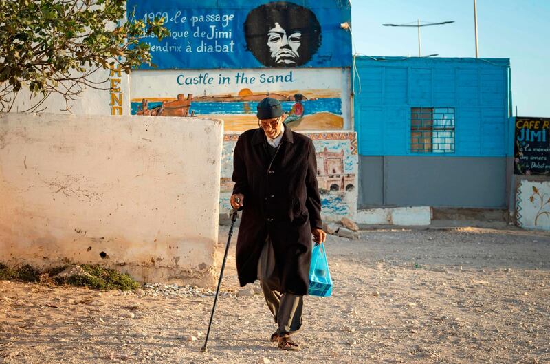 A picture taken in the Moroccan coastal city of Essaouira shows portraits of late US guitarist Jimi Hendrix.  AFP