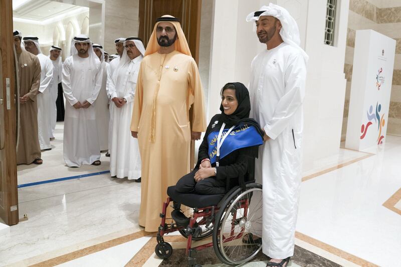 ABU DHABI, UNITED ARAB EMIRATES - March 10, 2019:  HH Sheikh Mohamed bin Zayed Al Nahyan, Crown Prince of Abu Dhabi and Deputy Supreme Commander of the UAE Armed Forces (R) and HH Sheikh Mohamed bin Rashid Al Maktoum, Vice-President, Prime Minister of the UAE, Ruler of Dubai and Minister of Defence (L), stand for a photograph with a participant during the Determination Retreat, at the Presidential Palace.

( Mohamed Al Hammadi / Ministry of Presidential Affairs )
---